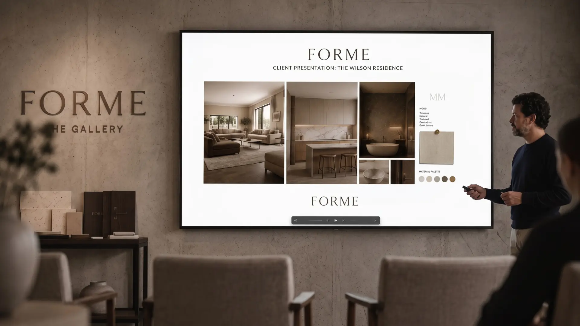 The FORME viewing room with a large wall-mounted screen showing a client presentation